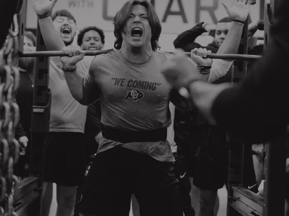 Royce participating in a bodybuilding competition